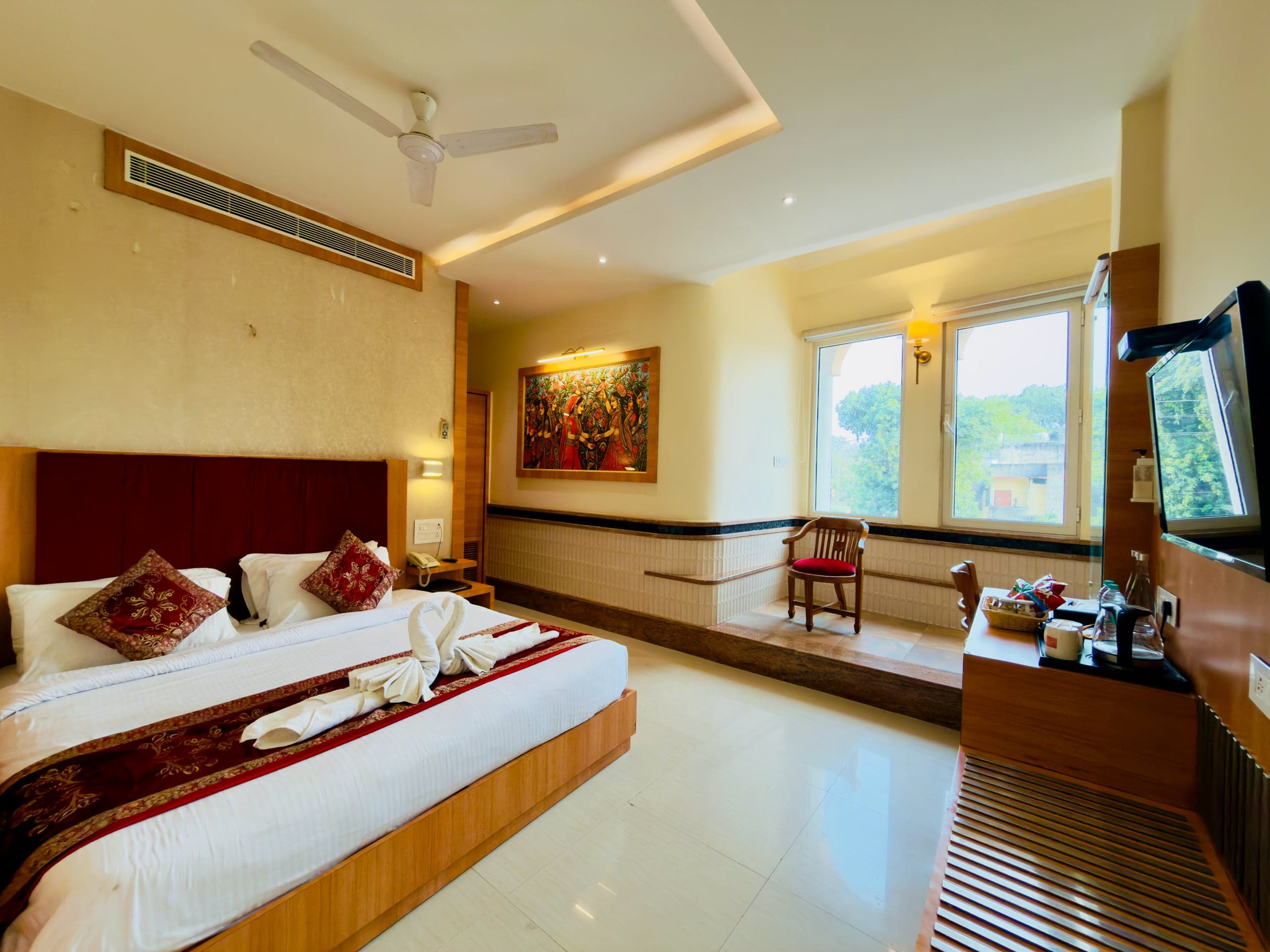 Mini Suite bedroom - spacious room with Banarasi art, bright window and marble floor